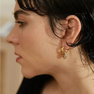 Gold-plated hoop earring with crystal pavé detail, elegant everyday jewelry for women