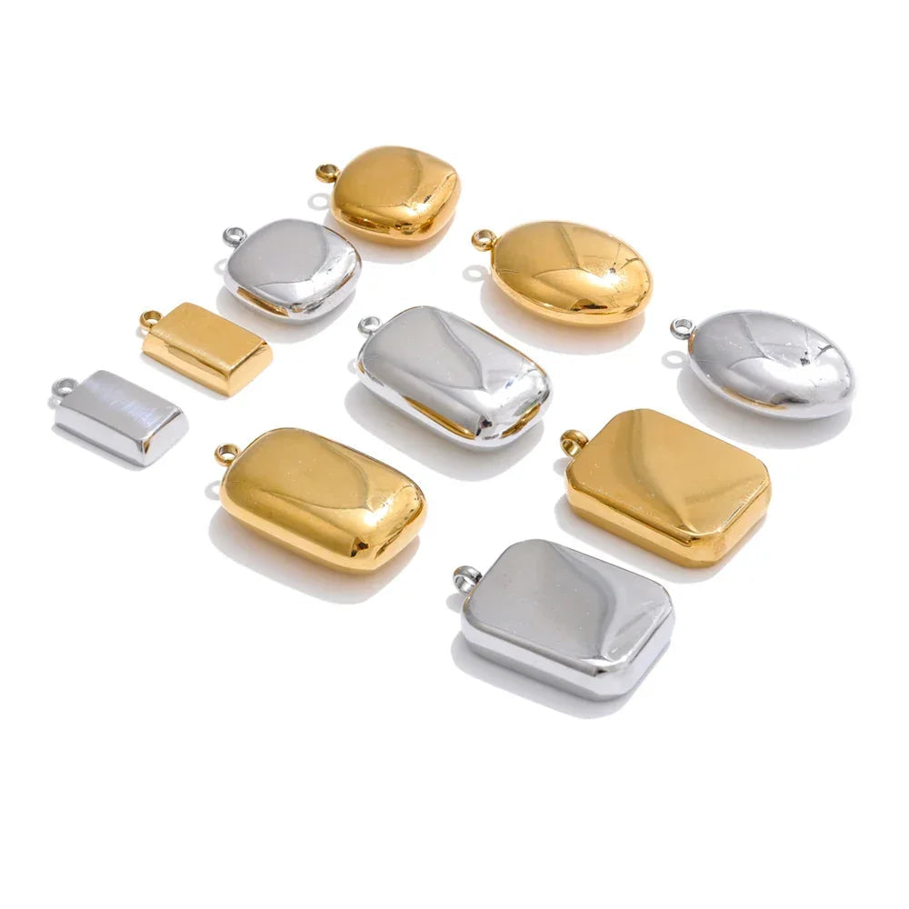 Gold and silver jewelry connectors on a white background.