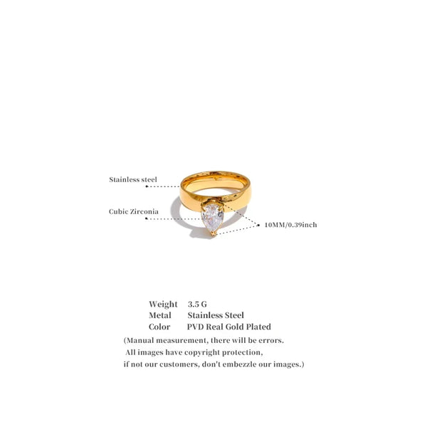 Gold ring with cubic zirconia on a white background