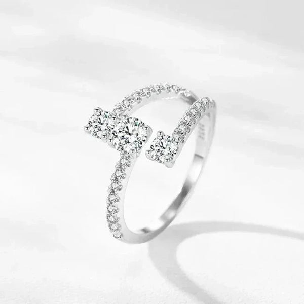 Elegant sterling silver ring with sparkling round and rectangular cubic zirconia stones