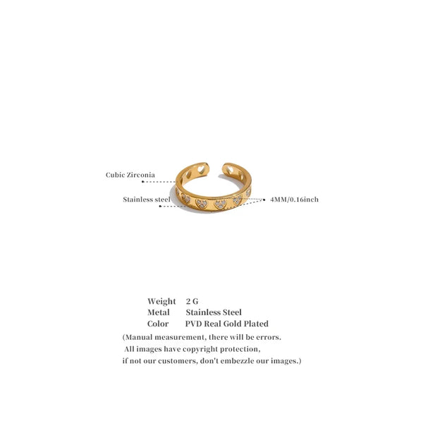 Gold ring with embedded stones on a white background