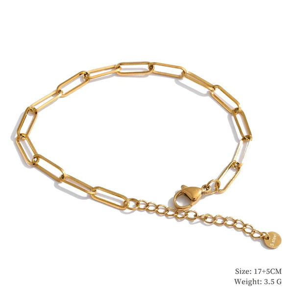 Gold chain bracelet on a white background