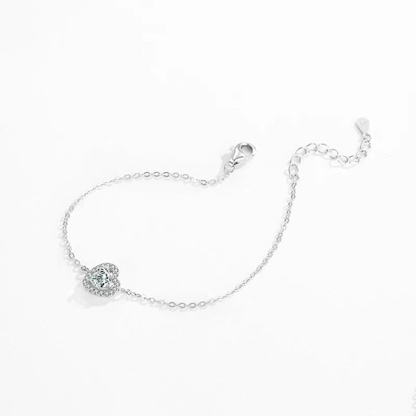 925 sterling silver bracelet with heart-shaped gemstone charm on white background