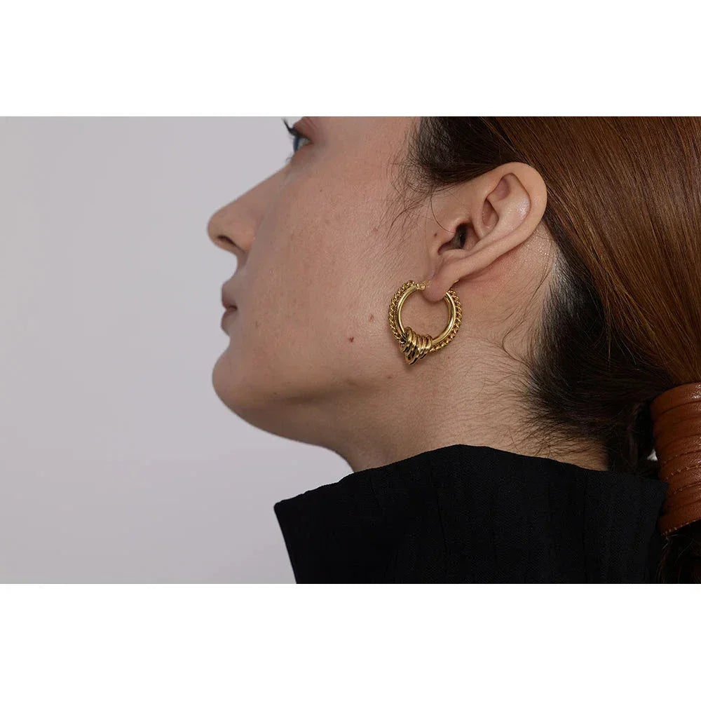 Twisted Huggie Earrings with Gold PVD Plating - TM & Co. Jewels