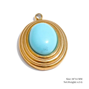Turquoise stone pendant with gold wire wrapping on a white background