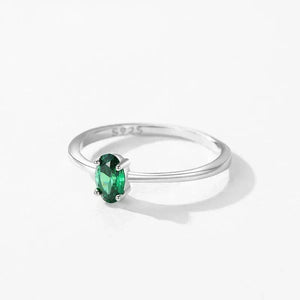 Pure Emerald CZ Ring - TM & Co. Jewels- Silver ring with a green gemstone on a white background.