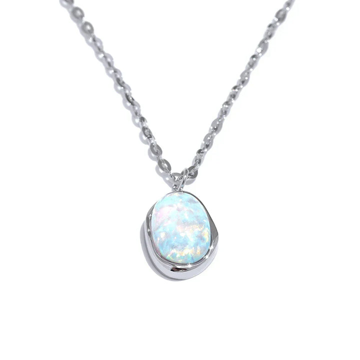 Necklace with a round opal pendant on a white background