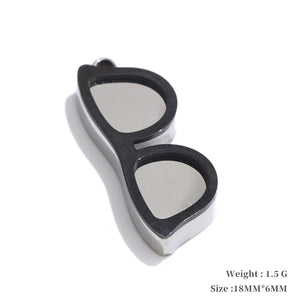 Black and silver eyeglass case on a white background