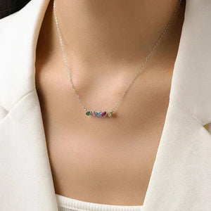Necklace with colorful gemstones worn by a person in a white outfit-Spectrum Shine Necklace - TM & CO. JEWELS 