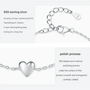 Mia Heart Bracelet - TM & CO. JEWELS bracelet with heart charm on a white background.