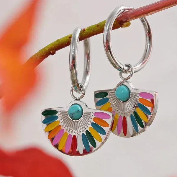 Colorful enamel and turquoise fan-shaped 925 silver hoop earrings on a branch