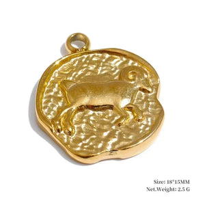 Gold pendant with a dog design on a white background