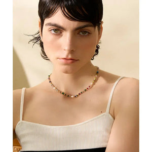 Woman wearing a colorful beaded necklace against a neutral background-Nouveau Bohème Necklace - TM & CO. JEWELS 