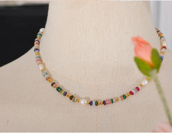 Multicolored beaded necklace on a mannequin with a pink flower-Nouveau Bohème Necklace - TM & CO. JEWELS 