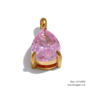 Pink teardrop-shaped gemstone pendant with gold setting on a white background
