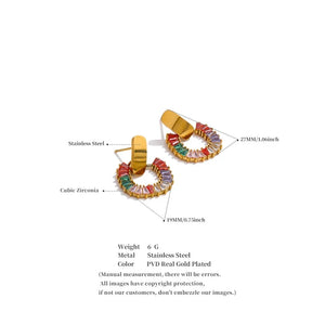 Gold hoop earrings with colorful gemstones on a white background