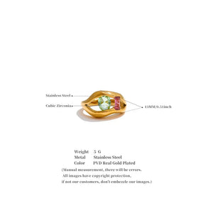 Gold ring with gemstones on a white background