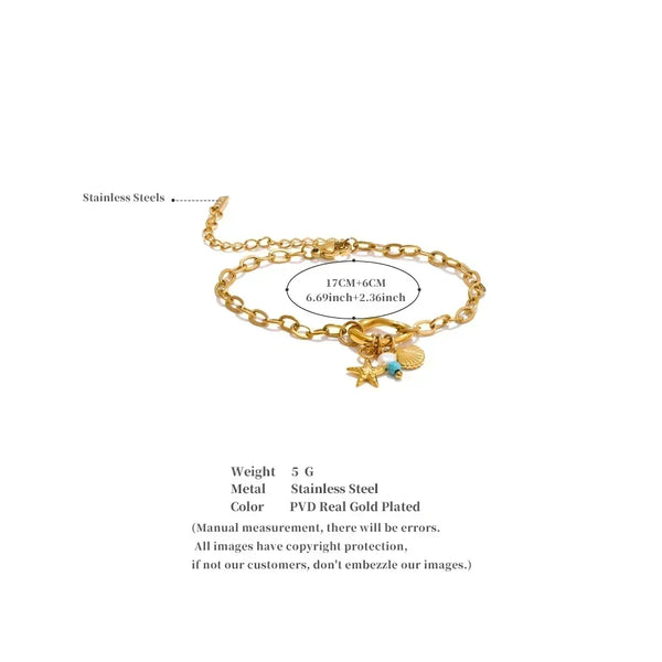 Gold bracelet with charms on a white background