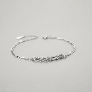 Opulent Silver Charm Bracelet