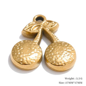 Gold pendant with textured surface on a white background
