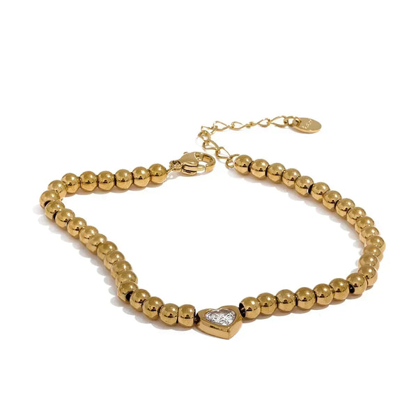 18K gold-plated beaded bracelet with a central heart-shaped charm and adjustable clasp