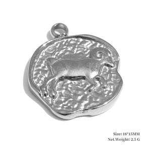 Silver pendant with a cat design on a white background