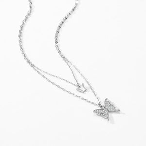 Silver butterfly necklace on a white background-Ethereal Wings Necklace - TM & CO. JEWELS 