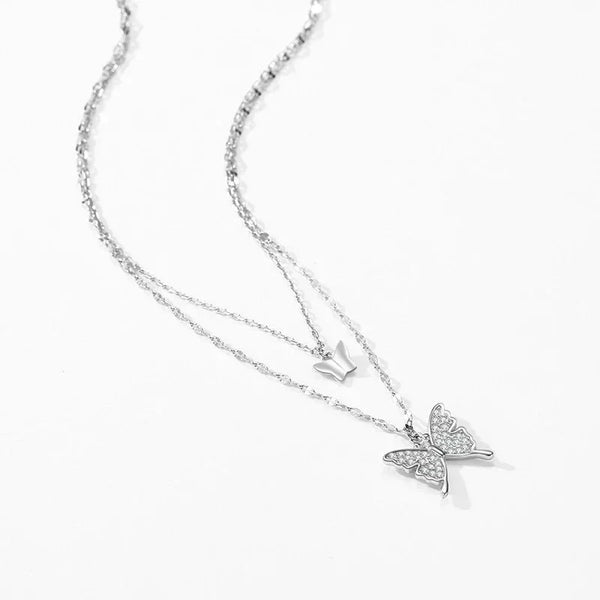 Silver butterfly necklace on a white background-Ethereal Wings Necklace - TM & CO. JEWELS 