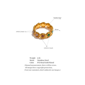 Gold ring with gemstones on a white background