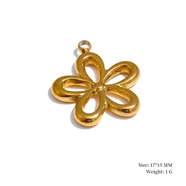 Gold four-leaf clover pendant on a white background