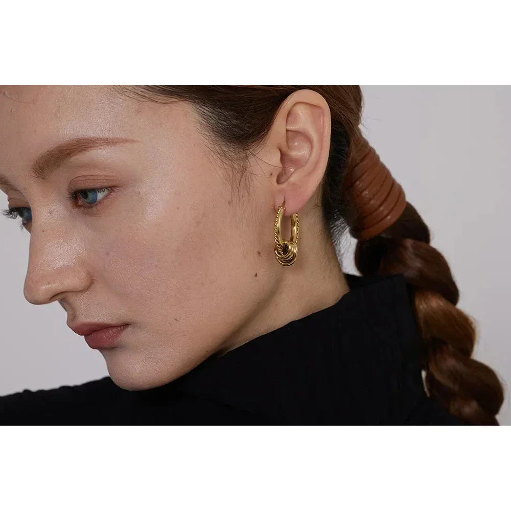 Twisted Huggie Earrings with Gold PVD Plating - TM & Co. Jewels
