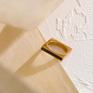 18K gold-plated square ring with black enamel detail on textured surface
