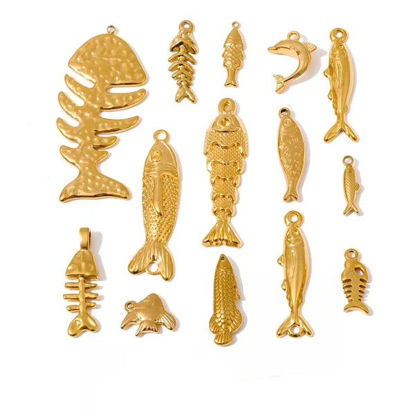 A set of gold-colored fish and fish skeleton charms with hanging loops, arranged on a plain white background with a black script logo at the bottom.