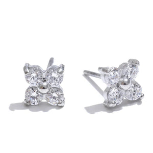 Butterfly-shaped silver earrings with clear gemstones on a white background