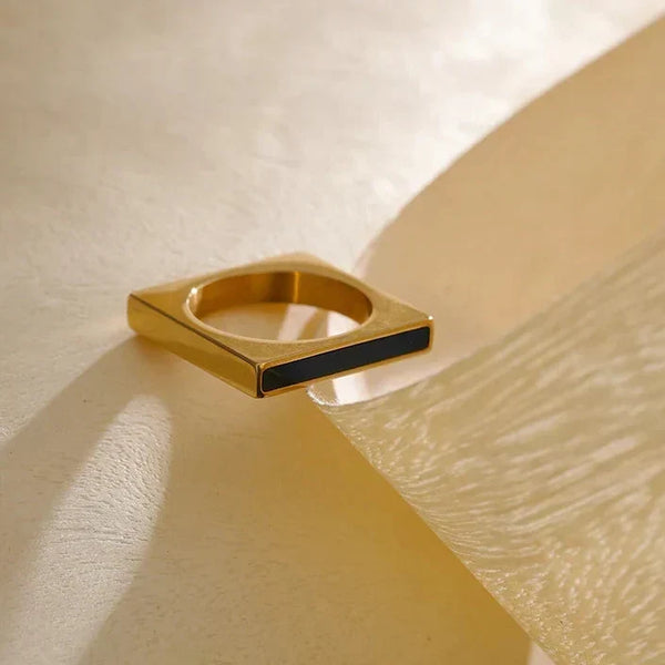 18K gold-plated square ring with black enamel detail on textured surface