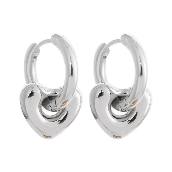 Astral Affection Hoops - TM & CO. JEWELS - Pair of gold hoop earrings on a white background.