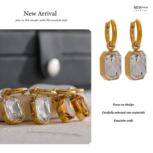 Gold earrings with clear gemstones on a neutral background, labeled 'New Arrival' and 'NEW++ Fashion'.