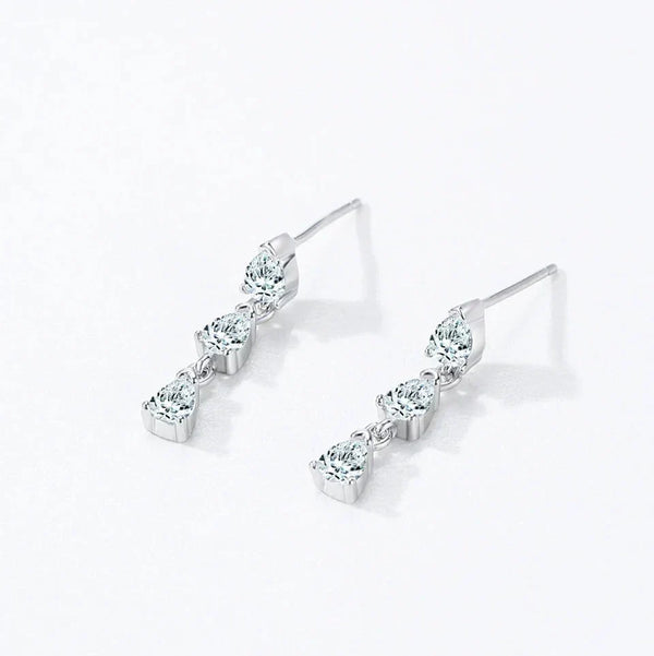 A pair of silver-toned drop earrings with three marquise-cut clear stones in each earring, displayed on a clean white background with 'Product Display' text at the top.