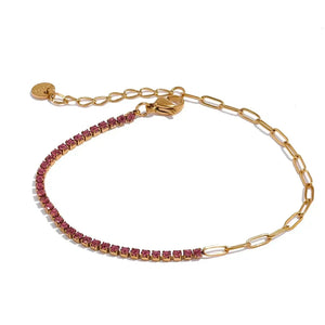 Gold-plated chain bracelet with pink gemstones and adjustable clasp on white background