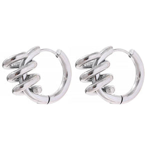 Pair of silver hoop earrings on a white background