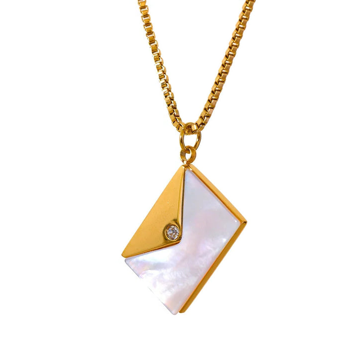 Gold necklace with a triangular pendant featuring a white stone and a small diamond on a white background
